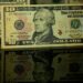 Federal Reserve Holds Rates Steady, Signals Future Cuts Amid Easing Inflation