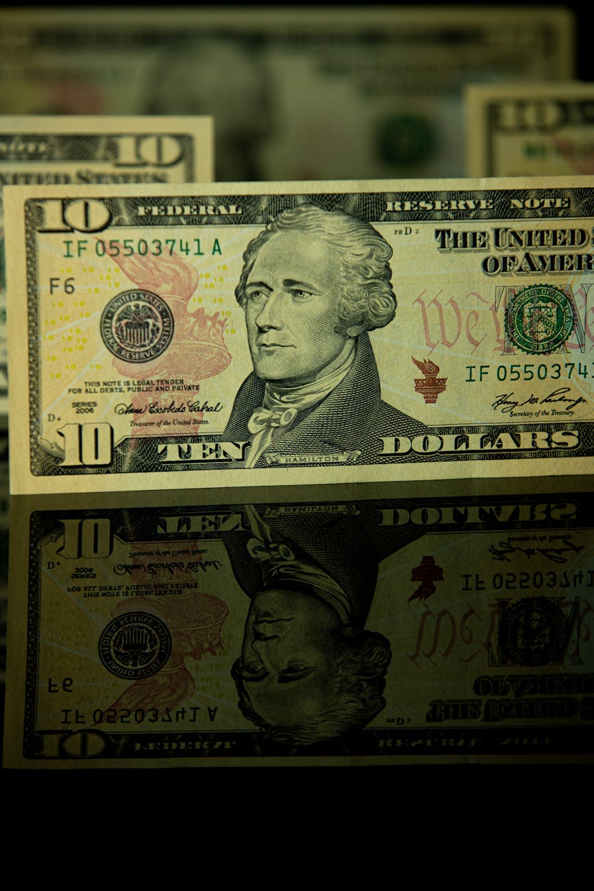 Federal Reserve Holds Rates Steady, Signals Future Cuts Amid Easing Inflation